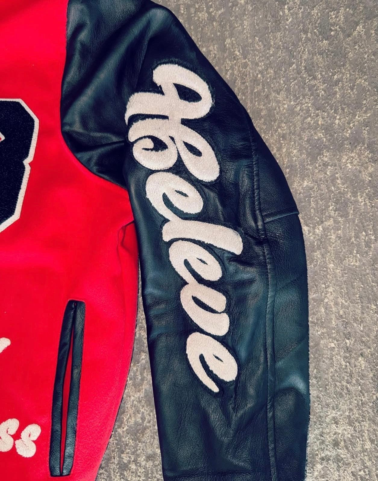 IBELEVE RED VARSITY JACKET