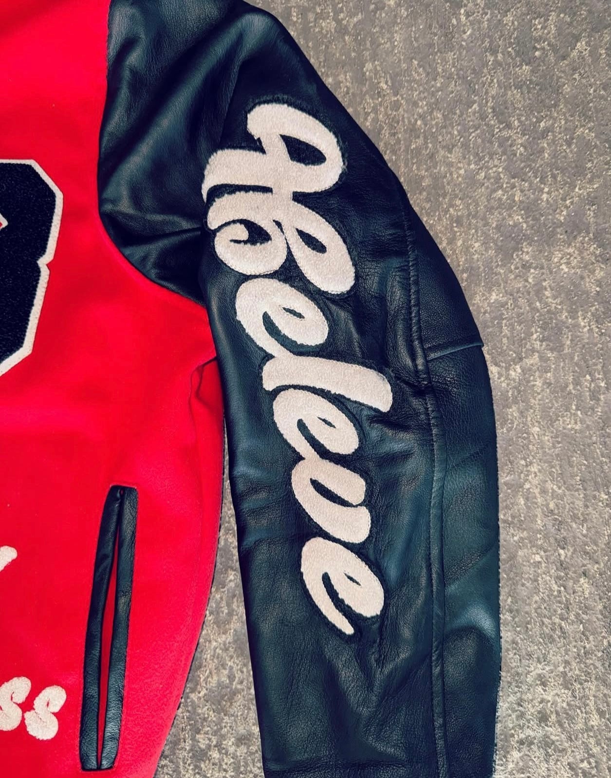IBELEVE RED VARSITY JACKET